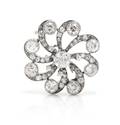 An Antique White Gold and Diamond Starburst Brooch