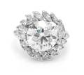 A Platinum and Round Brilliant Cut Diamond Ring