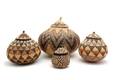 A Group of Four African Woven Zula Style Baskets
