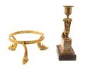 An Empire Gilt Bronze Figural Candlestick
