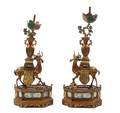 A Pair of Chinese Export Patinated Metal Figural Candlesticks
