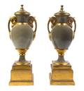 A Pair of Paris Porcelain Style Urns