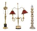 A Collection of Three Tole Lamps