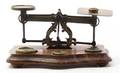A Brass and Walnut Postage Scale