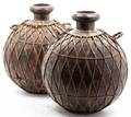 A Pair of African Copper Storage Vessels