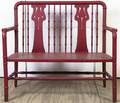A Red Painted Wood Bench