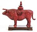 A Cinnabar Style Lacquered Figure of an Ox