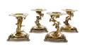 A Set of Four French SilverGilt Candle Stands
