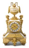 A Louis XVI Style Gilt Bronze and Onyx Mantel Clock
