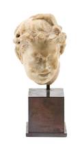 A Roman Marble Head of a Young Satyr