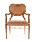 A Biedermeier Birch Open Armchair