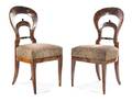 A Pair of Biedermeier Parcel Ebonized Walnut Side Chairs