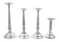 A Collection of Four Pewter Pricket Sticks