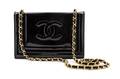 A Chanel Black Patent Leather Flap Bag