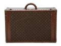 A Louis Vuitton Monogram Canvas Hardsided Suitcase