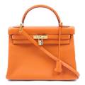 An Hermes 32cm Orange Leather Kelly Bag