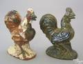 Two Stahl redware roosters 20th c