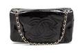 A Chanel Black Patent Vinyl Bag