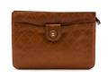 A Chanel Cognac Quilted Leather Clutch