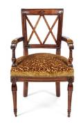 A French Provincial Style Carved Walnut Armchair