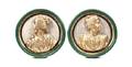 A Pair of Italian Gilt and Carved Roundels