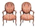 A Pair of Victorian Rosewood Upholstered Armchairs