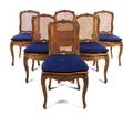 A Set of Six Louis XV Style Dining Chairs
