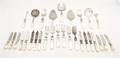 A Group of Silver and SilverPlate MotherofPearl Flatware Articles
