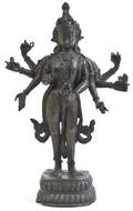 A Tibetan Bronze Figure of a Buddhist Deity