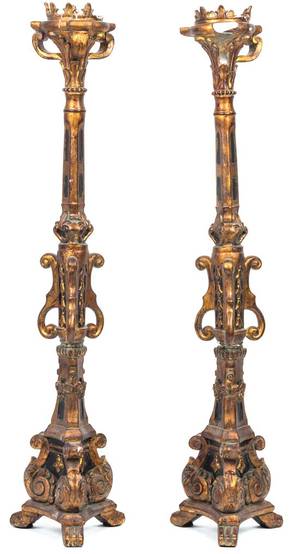 A Pair of Italian Baroque Style Composition Pricket Sticks
