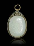 A Jade Inset Enameled Metal Pendant