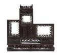 A Carved Hardwood Display Etagere