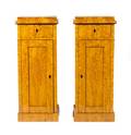 A Pair of Biedermeier Burlwood Veneered Pedestal Cabinets