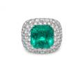 An 18 Karat White Gold Emerald and Diamond Ring