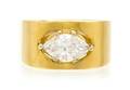 An 18 Karat Yellow Gold and Diamond Solitaire Ring