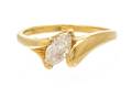 A 14 Karat Yellow Gold and Diamond Solitaire Ring