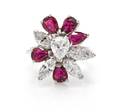 An 18 Karat White Gold Diamond and Ruby Spray Ring