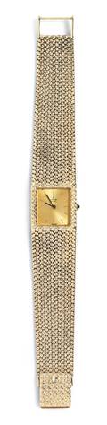 A 14 Karat Yellow Gold Watch Concord