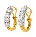 A Pair of Platinum 18 Karat Yellow Gold and Diamond Earclips