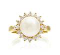 An 18 Karat Yellow Gold Cultured Pearl and Diamond Ring