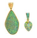 A Collection of Yellow Gold and Opal Pendants