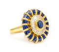 An 18 Karat Yellow Gold Sapphire and Diamond Ring