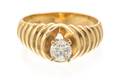 A 14 Karat Yellow Gold and Diamond Ring