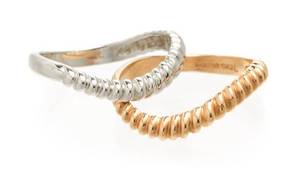 A Pair Of 14 Karat Rose and White Gold Stacking Rings