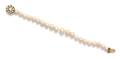 A 14 Karat Yellow Gold and Cultured Pearl Bracelet