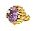 An 18 Karat Yellow Gold Amethyst and Diamond Ring