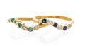 A Collection of 18 Karat Yellow Gold Sapphire Emerald and Diamond Stacking Rings