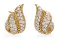 A Pair of 18 Karat Gold and Diamond Earclips