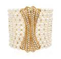 An 18 Karat Yellow Gold Cultured Pearl and Diamond Cuff Bracelet