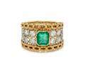 An 18 Karat Two Tone Gold Emerald and Diamond Ring Buccellati